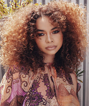 18 Curly Copper Hair Goals That'll Jump Start Your New Summer Look