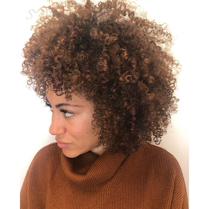 How to Avoid Dry Brittle Hair When Coloring Curls in the Winter According to an Expert 