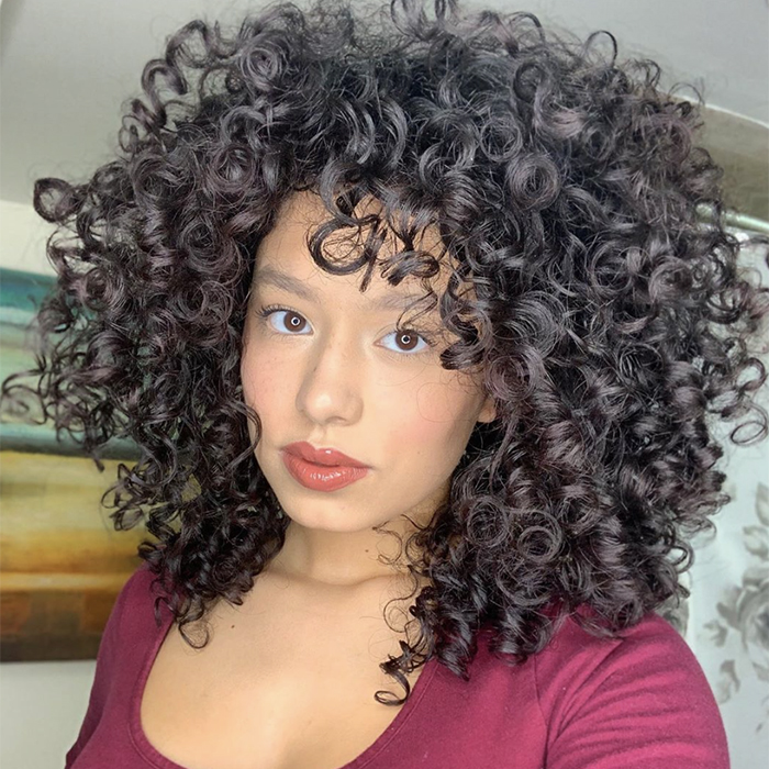 The Key Benefits of Hot Oil Treatments for Curly Hair
