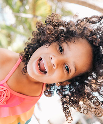 How to Care for Your Kids' Curls This Summer
