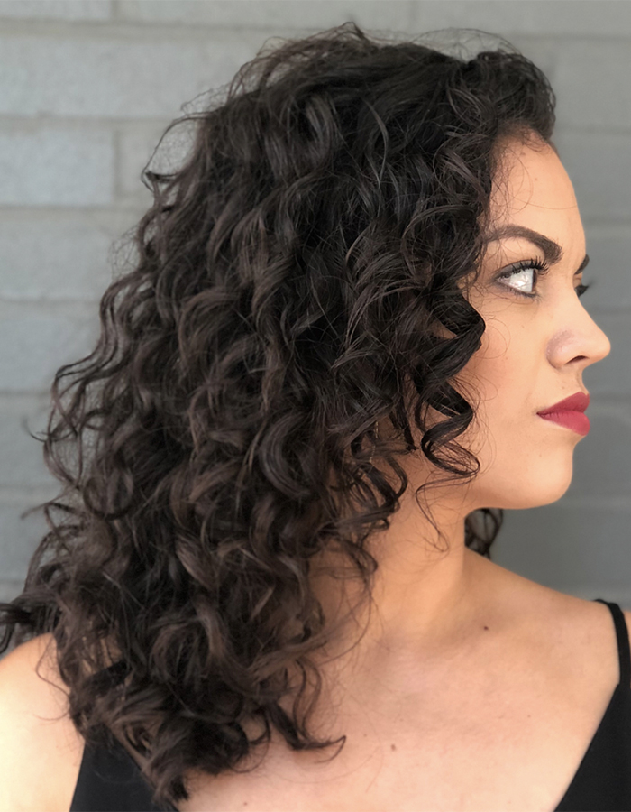 The Top Hair Hacks to Refresh Curly Hair on the Go According to an Expert 
