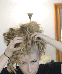 WATCH: A Bun Tutorial that WON'T Stretch Out Your Curls