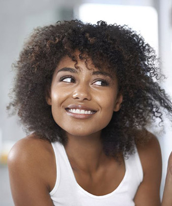 5 Signs to Know Your Curly Hair Needs a Trim