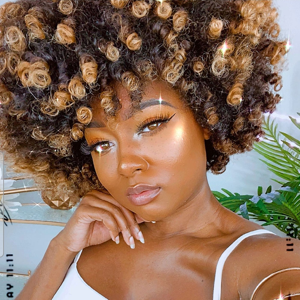 Two-toned blonde and brown perm rods set on natural hair