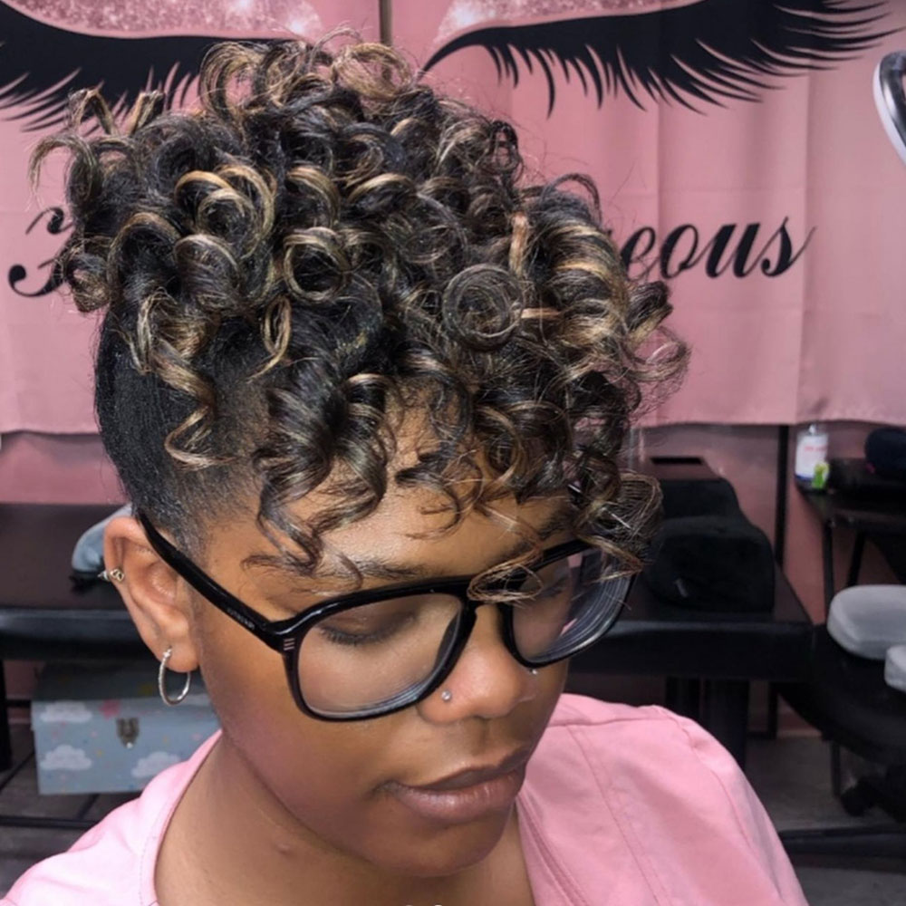 Updo flexi rod set on natural hair with blond highlights