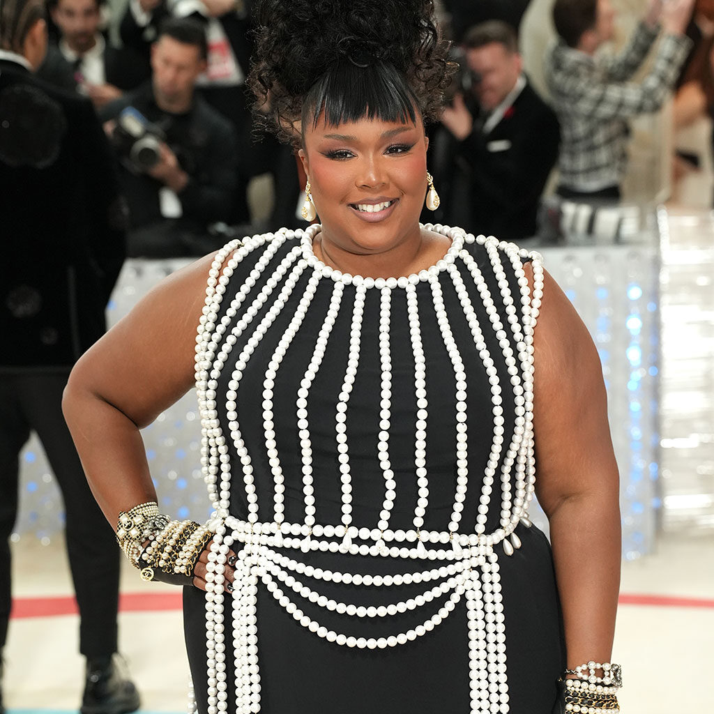 Lizzo's updo bangs hairstyle at the Met Gala 2023