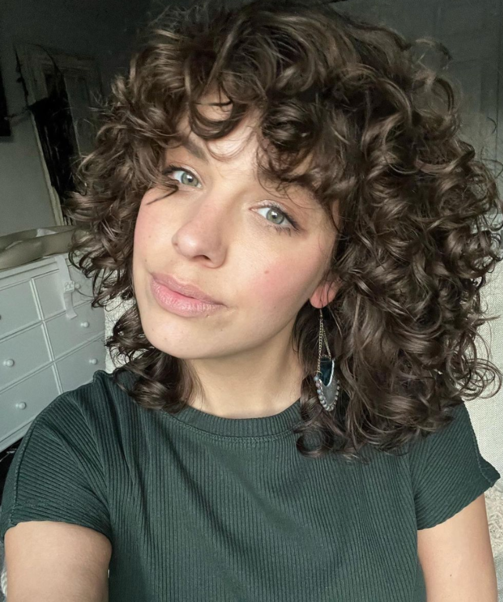 How to Ask Your Hair Stylist for a Curly Haircut with Bangs