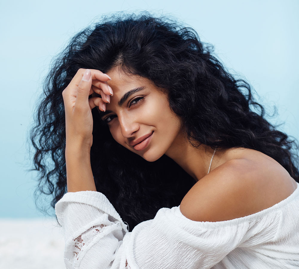The Benefits of Antioxidants for Your Hair, According to a Curl Chemist