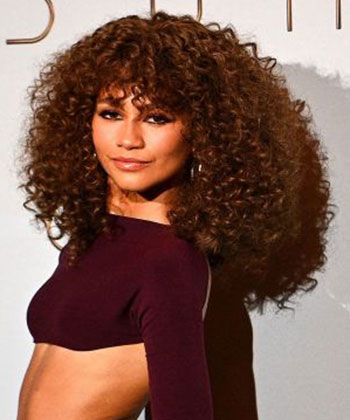 Celebrity Stylist Antoinette Hill Shares How to Create Frizz-Free Curls